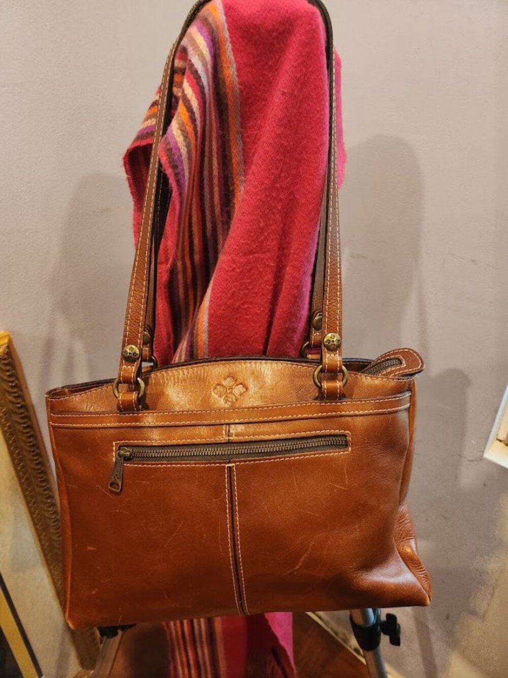 a big brown leather bag